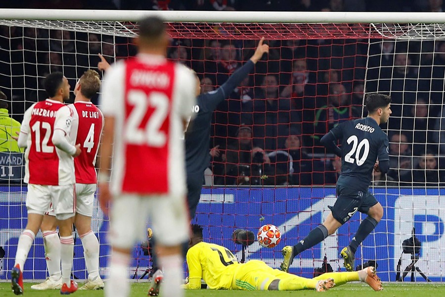 Real Madrid's Marco Asensio scores their second goal against Ajax on Wednesday — Reuters photo