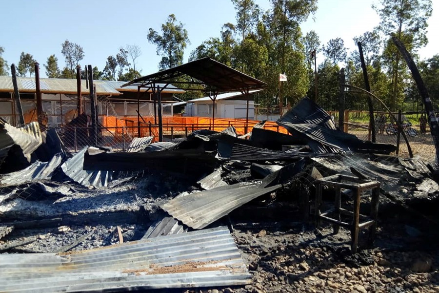 Burned structures are seen after attackers set fire to an Ebola treatment center run by Medecins Sans Frontieres (MSF) in the east Congolese town of Katwa, Democratic Republic of Congo on Monday — MSF handout via Reuters