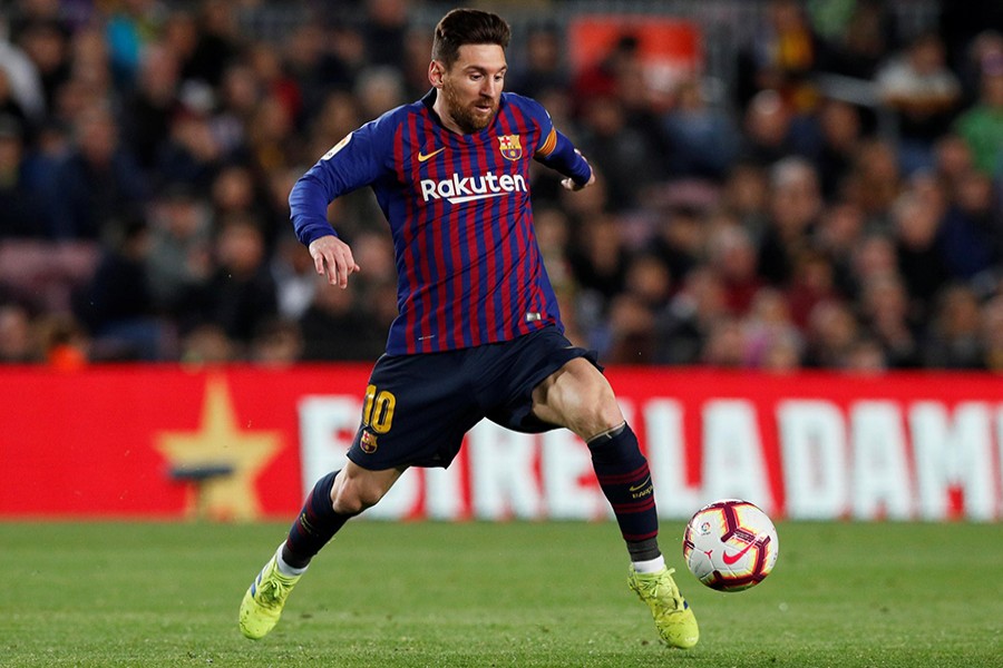 Barcelona's Lionel Messi in action againt Rayo Vallecano during Saturday's clash — Reuters action image