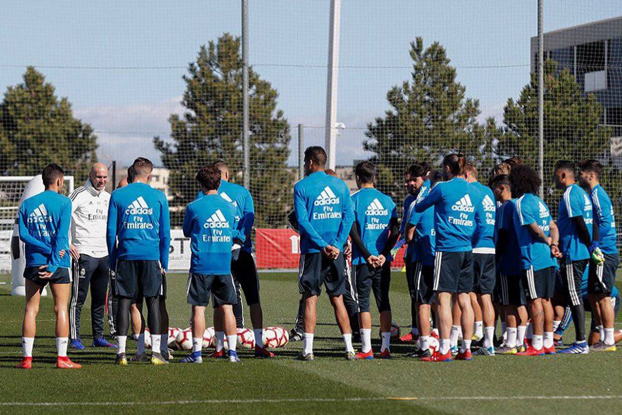 Real Madrid's new head coach Zinedine Zidane leading his first training session after his appointment at Valdebebas sport complex, outside Madrid on Wednesday	— Internet