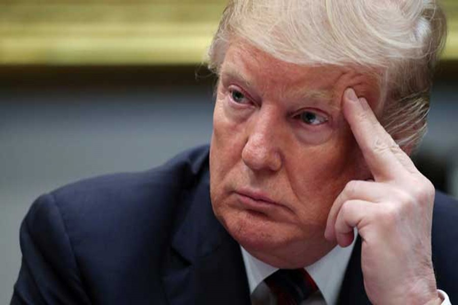 US President Donald Trump participates in a briefing on "drug trafficking on the southern border" in the Roosevelt Room at the White House in Washington, US, March 13, 2019. Reuters