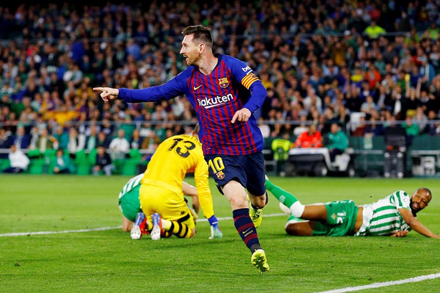 Barcelona's Lionel Messi celebrates scoring their second goal against Real Betis — Reuters photo