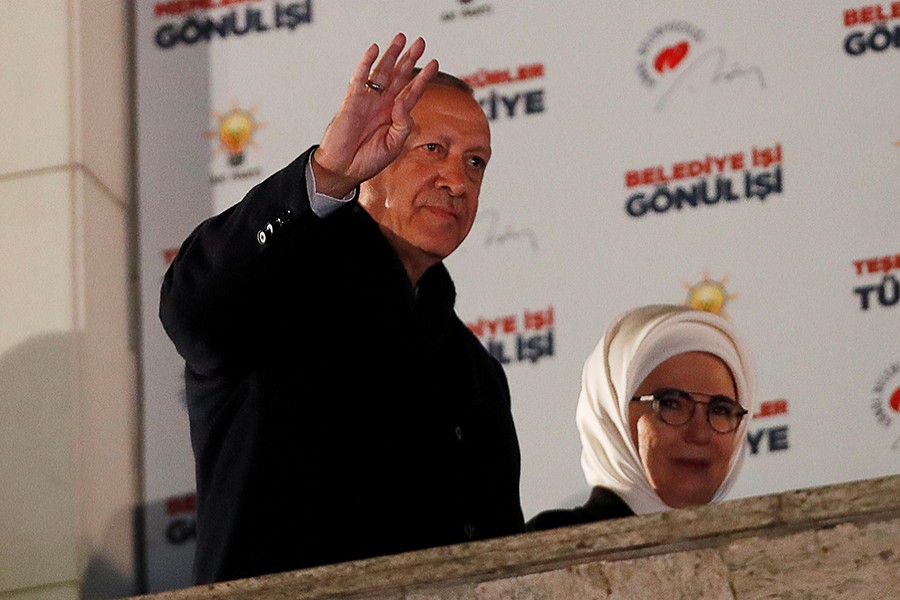 Turkish President Tayyip Erdogan and his wife Emine greet supporters in Ankara on April 1, 2019 — Reuters photo