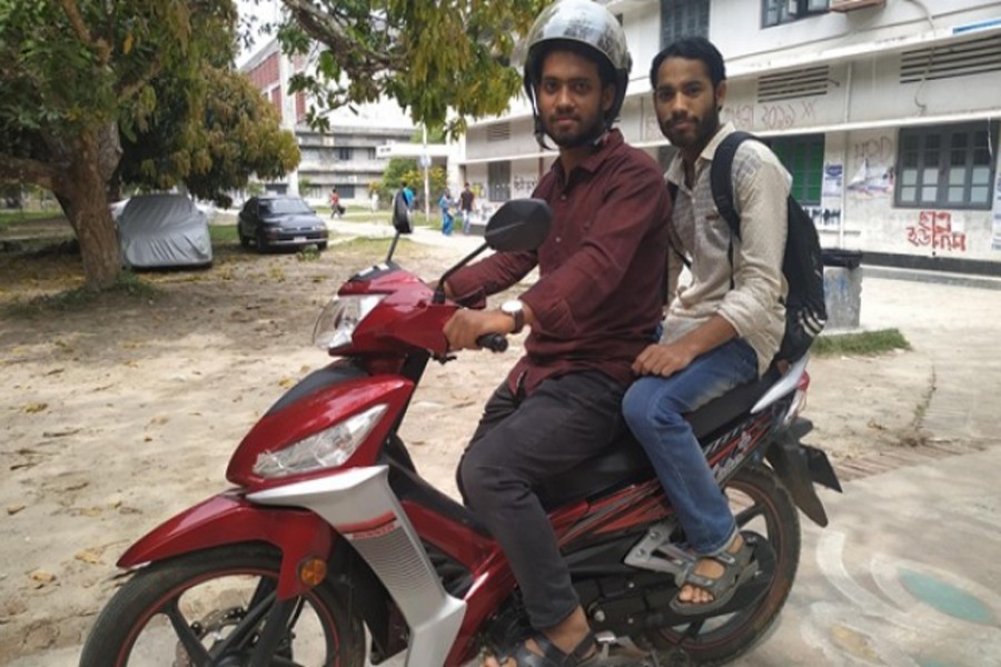 RU Geology and Mining Department student Masud Parvez introduced the motorcycle ride sharing service on the campus recently        	— FE Photo