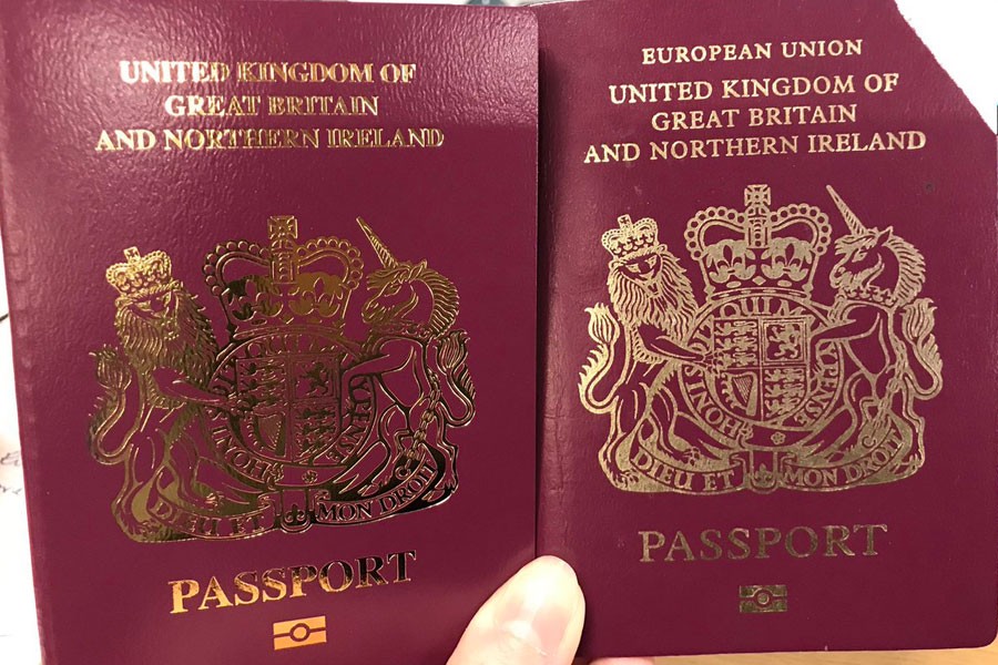 The photo shows new British passport on the left and the old one in the right - Courtesy: Susan Hindle Barone/ Twitter