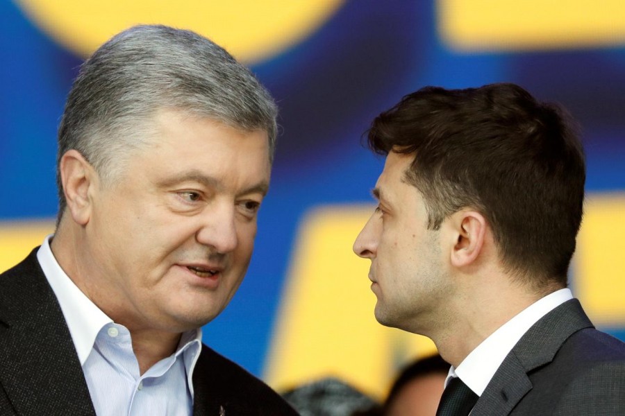 Ukraine's President and presidential candidate Petro Poroshenko attends a policy debate with his rival, comedian Volodymyr Zelenskiy, at the National Sports Complex Olimpiyskiy stadium in Kiev, Ukraine April 19, 2019 - REUTERS/Valentyn Ogirenko