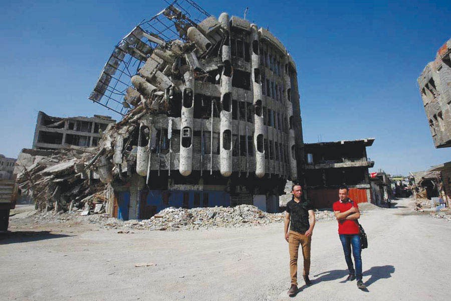 Caption:  A DAMAGED BUILDING IN MOSUL : Terrorism cannot always be mentioned as the causal factor: Iraq was invaded by US President George W. Bush's argument that Saddam Hussein "tried to kill my dad."           — Photo: Reuters