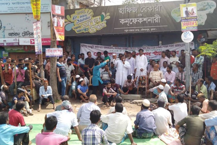 Jute mill workers continue demo
