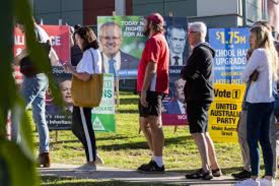 People voting in the seat of Dickson are seen arriving to vote at Patricks Road State School on Election Day in Brisbane, Queensland, Australia May 18, 2019 - AAP Image/Glenn Hunt/via REUTERS