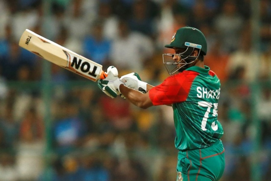 Cricket - India v Bangladesh - World Twenty20 cricket tournament - Bengaluru, India, 23/03/2016. Bangladesh's Shakib Al Hasan plays a shot. Reuters/Files