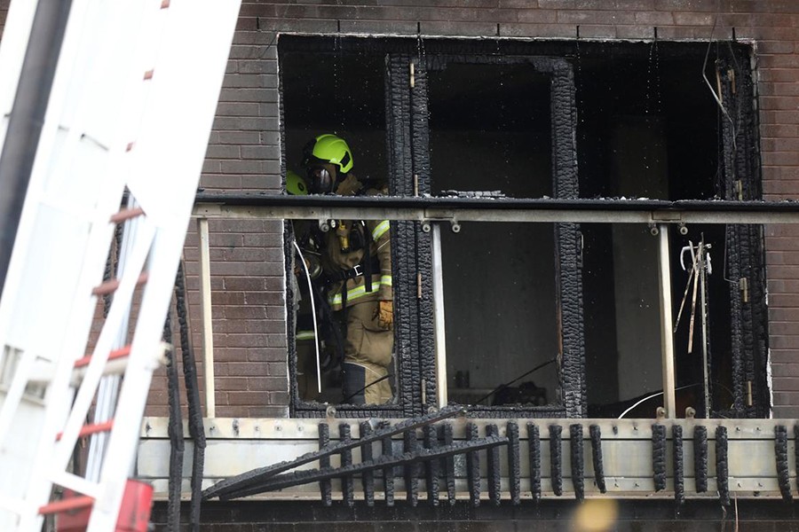 Firefighters work at the building where a fire broke out in Barking, London, Britain on June 9, 2019 — Reuters photo