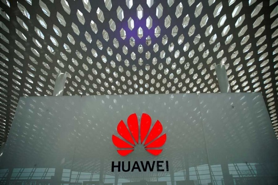 A Huawei company logo at the Shenzhen International Airport in Shenzhen, Guangdong province, China Jun 17, 2019. Reuters/Files