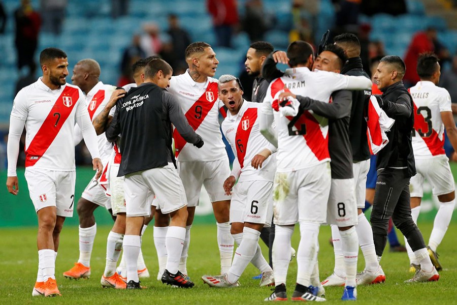 Peru players celebrate winning the clash against Chile — Reuters photo