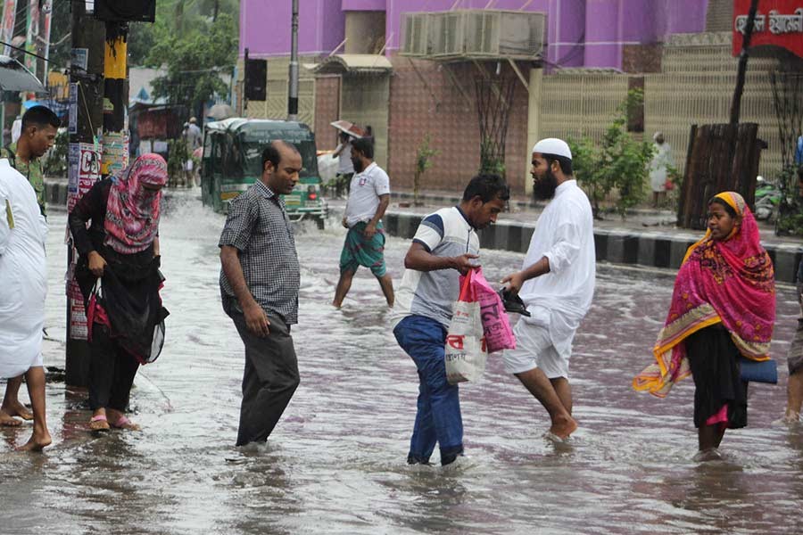Rainwater submerges city streets, commuters suffer