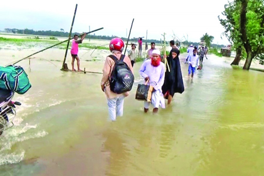Swelling rivers worsen floods in 15 districts