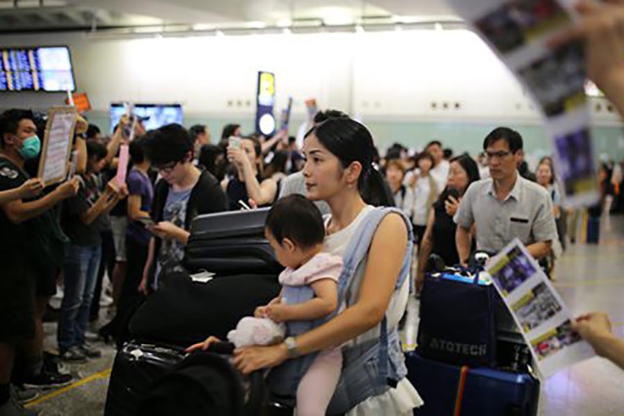 Hong Kong protesters obstruct international airport