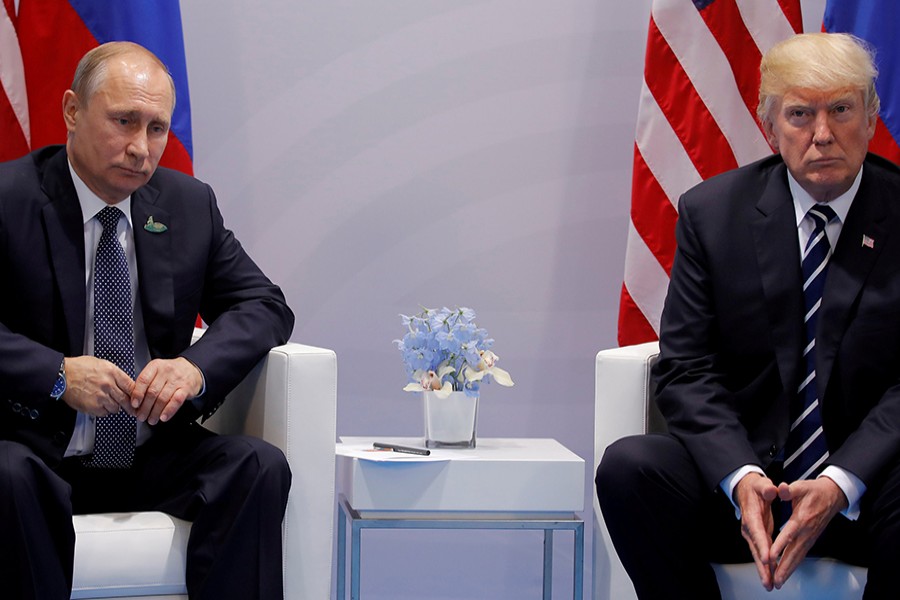 US President Donald Trump meets with Russian President Vladimir Putin during their bilateral meeting at the G20 summit in Hamburg, Germany on July 7, 2017 — Reuters/Files