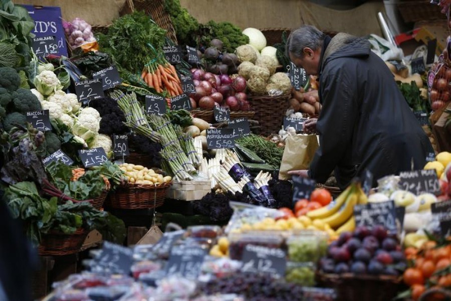 A shopper browses at a vegetable market, in London, Britain February 3, 2017 - REUTERS/Peter Nicholls