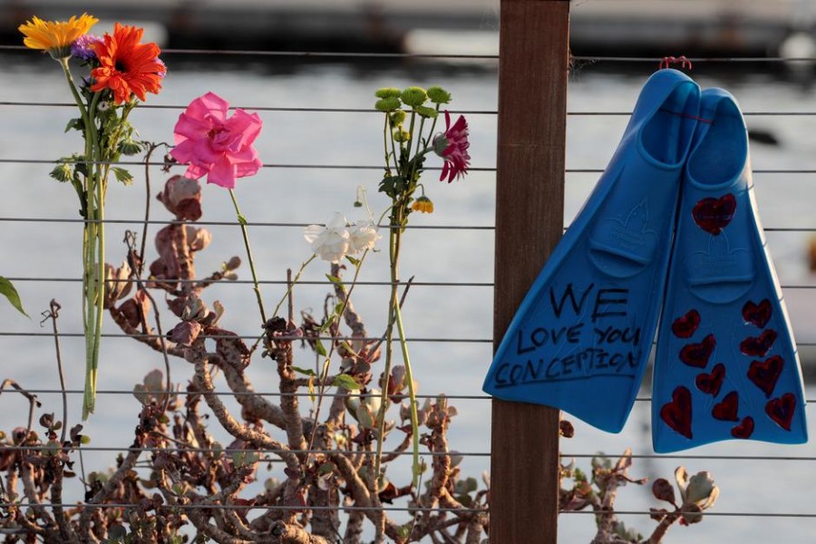 Flowers are seen at a makeshift memorial near Truth Aquatics as the search continues for those missing in a pre-dawn fire that sank a commercial diving boat off a Southern California island near Santa Barbara, California, U.S., September 2, 2019. REUTERS/Kyle Grillot