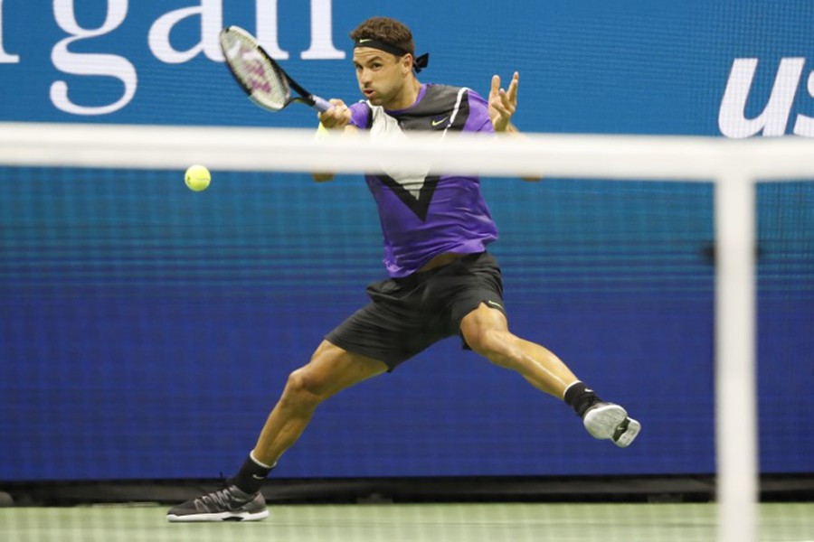 Grigor Dimitrov of Bulgaria hits a forehand against Roger Federer of Switzerland (not pictured) in a quarterfinal match on day nine of the 2019 US Open tennis tournament at USTA Billie Jean King National Tennis Center — Geoff Burke-USA TODAY Sports via REUTERS