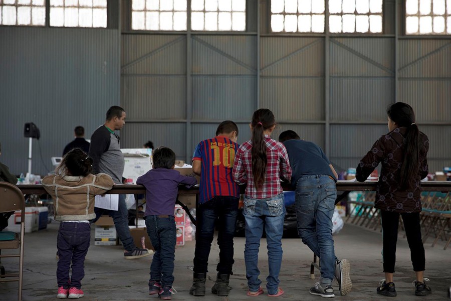 Migrant children stand at a shelter and processing centre in Deming, New Mexico, US on May 27, 2019. May 27, 2019 — Reuters/Files