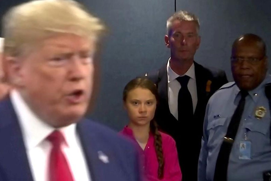 Swedish environmental activist Greta Thunberg watches as U.S. President Donald Trump enters the United Nations to speak with reporters in a still image from video taken in New York City, U.S. September 23, 2019. REUTERS/Andrew Hofstetter