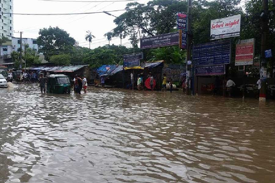City roads go under rainwater, commuters suffer