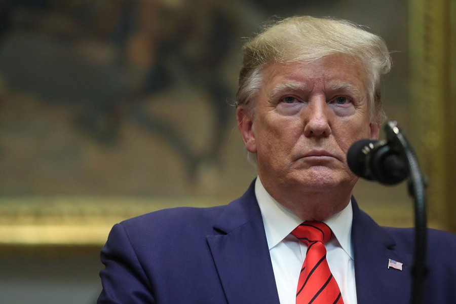 US President Donald Trump speaks to reporters after signing executive orders on federal regulation at the White House in Washington, US on October 9, 2019 — Reuters/Files