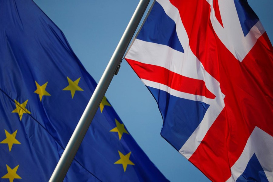 European Union and British flags flutter in front of a chancellery ahead of a visit of British Prime Minister Theresa May in Berlin, Germany, April 9, 2019. Reuters/Files