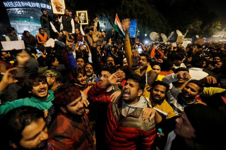 Demonstrators shout slogans during a protest against a new citizenship law, outside the police headquarters in New Delhi, India, December 16, 2019. REUTERS/Adnan Abidi