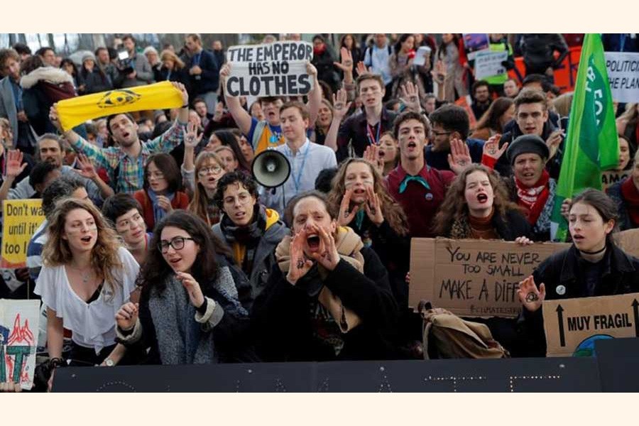 Activists protest outside the venue of the UN Climate Change Conference  (COP25) in Madrid.           —Photo: Reuters   