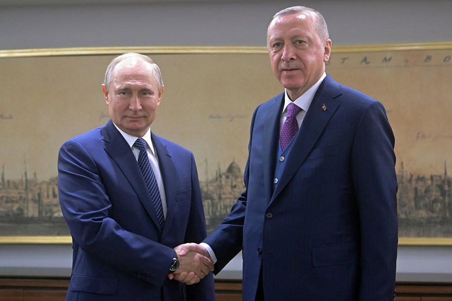 Turkish President Tayyip Erdogan shaking hands with his Russian counterpart Vladimir Putin during a meeting in Istanbul, Turkey on Wednesday. -Reuters Photo