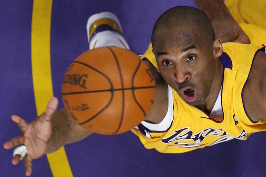 Los Angeles Lakers Kobe Bryant jumps for a rebound against the Denver Nuggets during Game 2 of their NBA Western Conference final basketball playoff game in Los Angeles on May 21, 2009 — REUTERS/Files