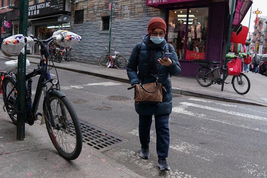 A resident of Chinatown wears a surgical mask in New York City, US on January 31, 2020 — Reuters photo