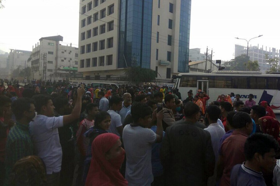 Apparel workers block road at Mohakhali protesting job cuts