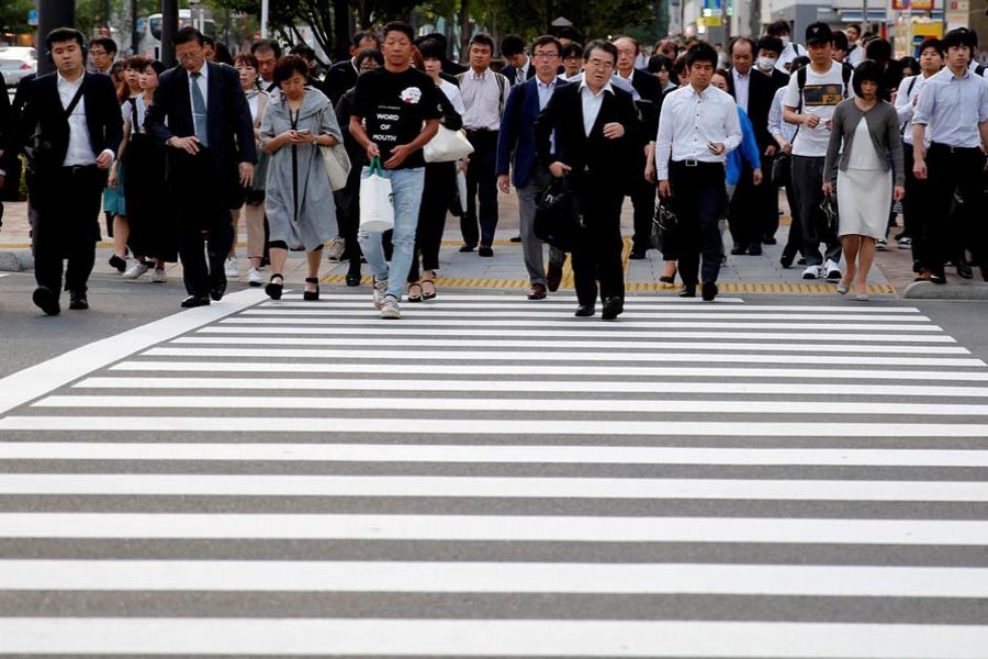 Japan on brink of recession as economy contracts, virus heightens risk      