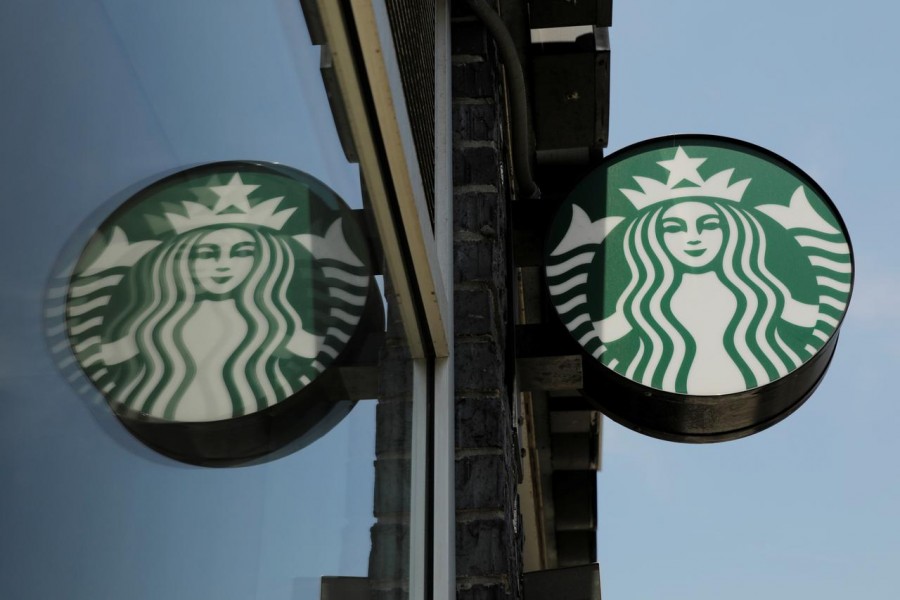 Starbucks closes most US, Canada cafes, moves to drive-through