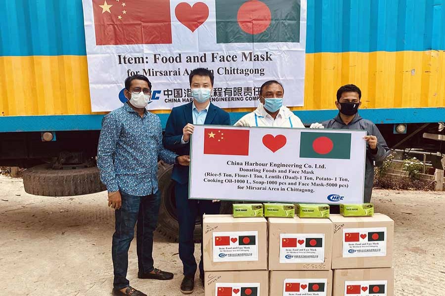 China Harbour stands beside Corona-hit people