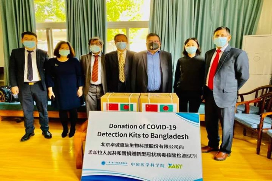 Two Chinese institutions donate 2,000 testing kits