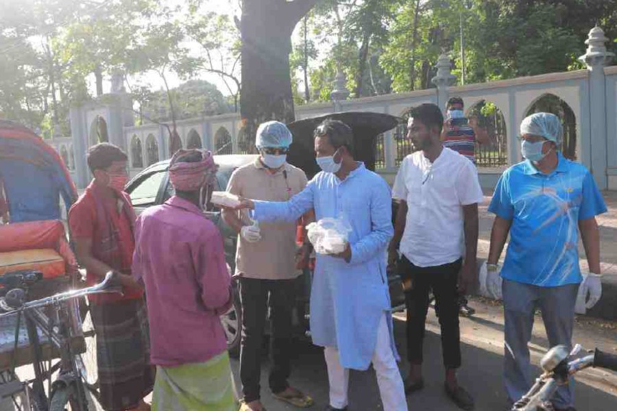 Youths feed poor as BD goes into lockdown mode