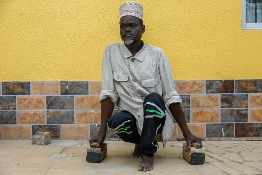 FILE PHOTO: Shehu Isah Daiyanu Dumus, 53, poses for a photo near his home in Lagos, Nigeria April 6, 2020. Picture taken April 6, 2020. REUTERS/Temilade Adelaja