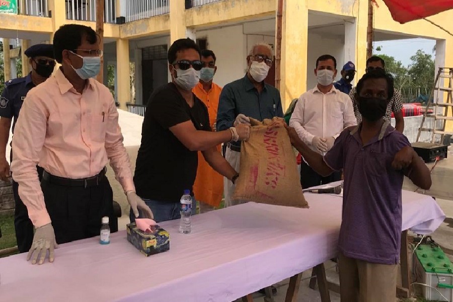 Bangladesh-India Friendship Power Company distributes relief in Bagerhat