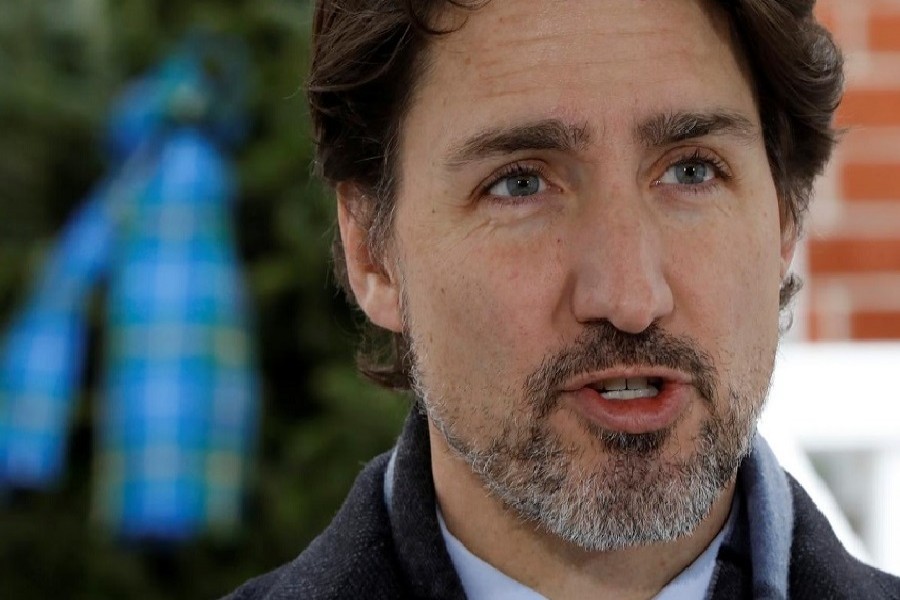 Canada's Prime Minister Justin Trudeau speaks during a news conference at Rideau Cottage, as efforts continue to slow the spread of the coronavirus disease (COVID-19), in Ottawa, Ontario, Canada, April 24, 2020. The trees are tied with Nova Scotian tartan. — Reuters