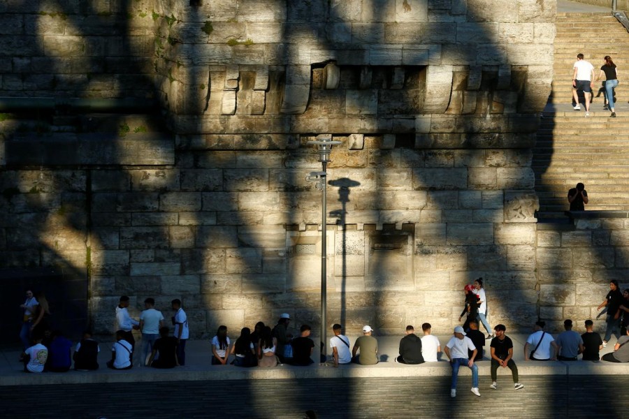 People spend time at the Rhine River, as the spread of the coronavirus disease (COVID-19) continues, in Cologne, Germany on May 21, 2020 — Reuters photo