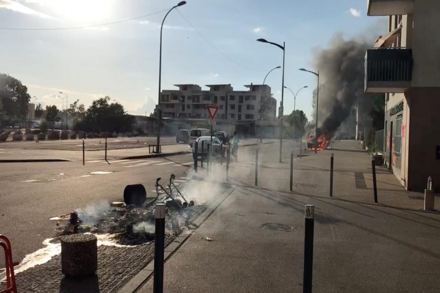 Fire spots and debris are seen after the fourth night of gang violence in Dijon, France June 15, 2020, in this still image obtained from a social media video. Jim Cannolo/via REUTERS