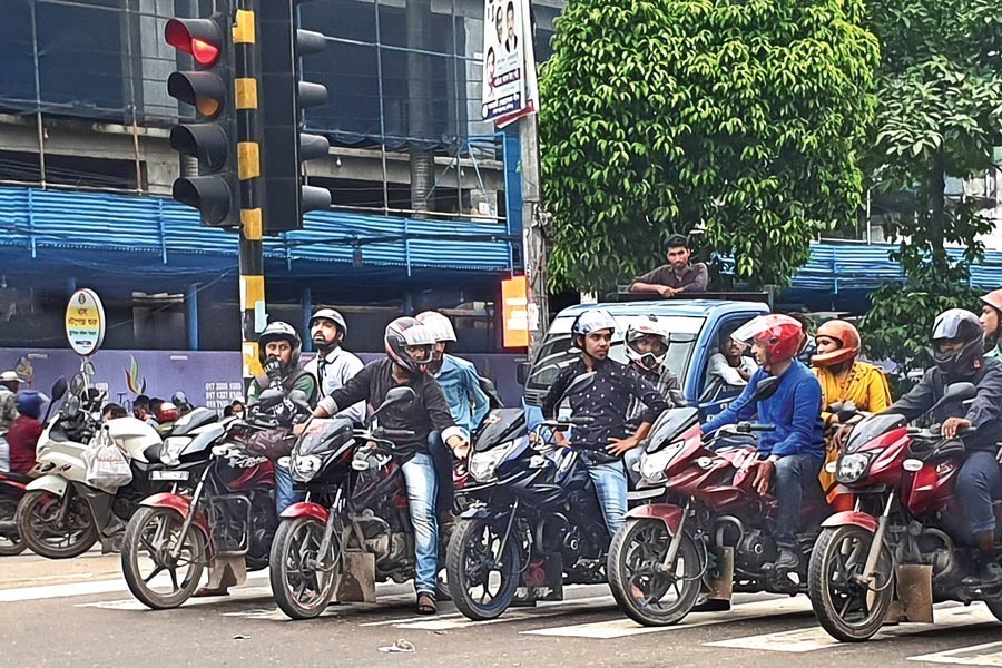 Pandemic forces many to become ride-sharing bikers for a living