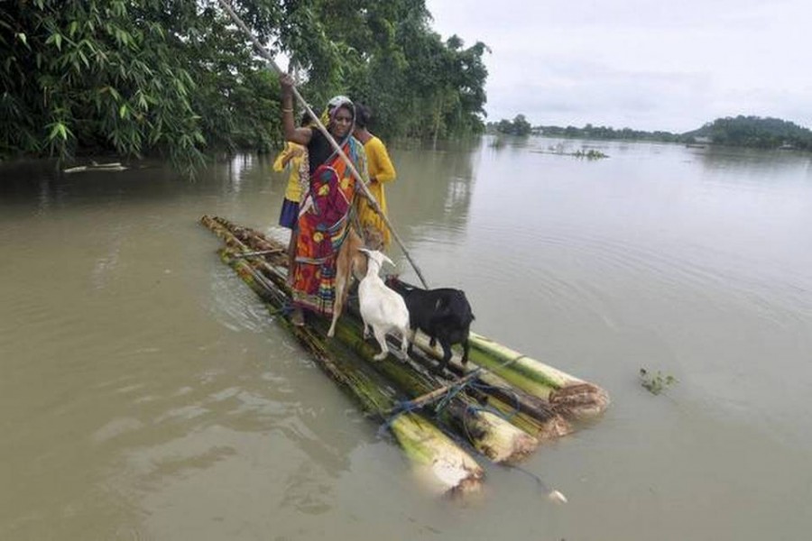 Floods ravage eastern India as coronavirus infections surge
