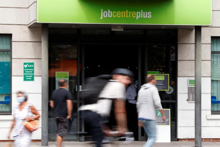 People walk past a branch of Jobcentre Plus, a government run employment support and benefits agency, as the outbreak of the coronavirus disease (Covid-19) continues, in Hackney, London, Britain on August 6, 2020 — Reuters photo