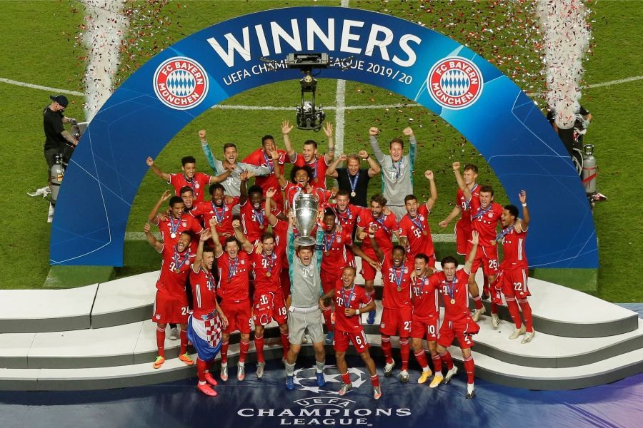 General view as Bayern Munich players celebrate winning the Champions League with the trophy, as play resumes behind closed doors following the outbreak of the coronavirus disease (COVID-19) Manu Fernandez/Pool via REUTERS