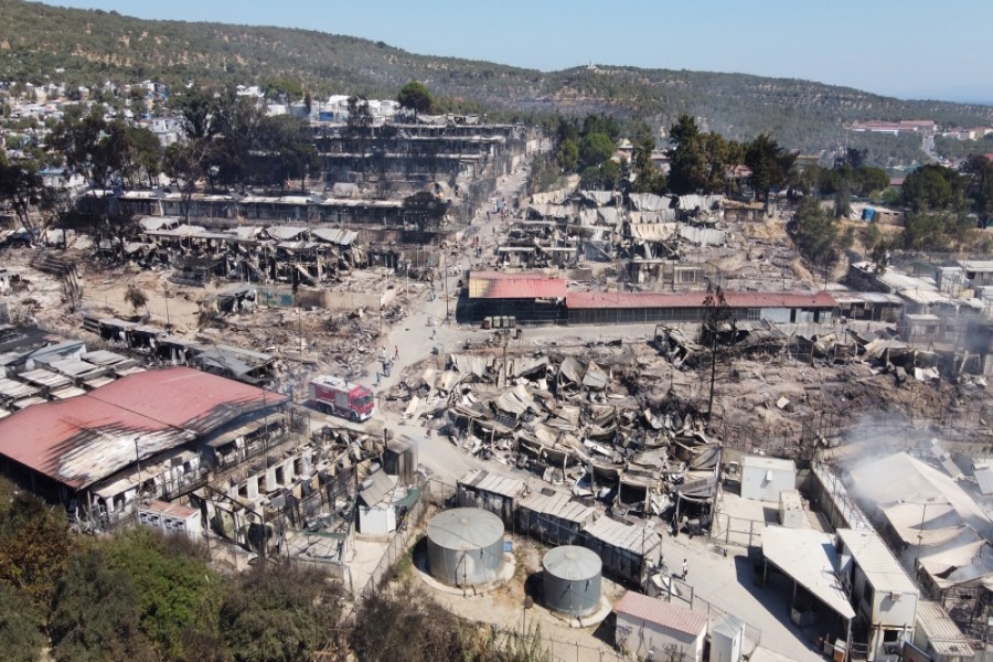 An aerial view of destroyed shelters following the fire at the Moria camp, in a picture taken with a drone [Alkis Konstantinidis/Reuters]